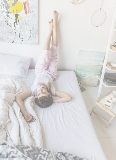 stock-photo-young-woman-pajamas-resting-bed